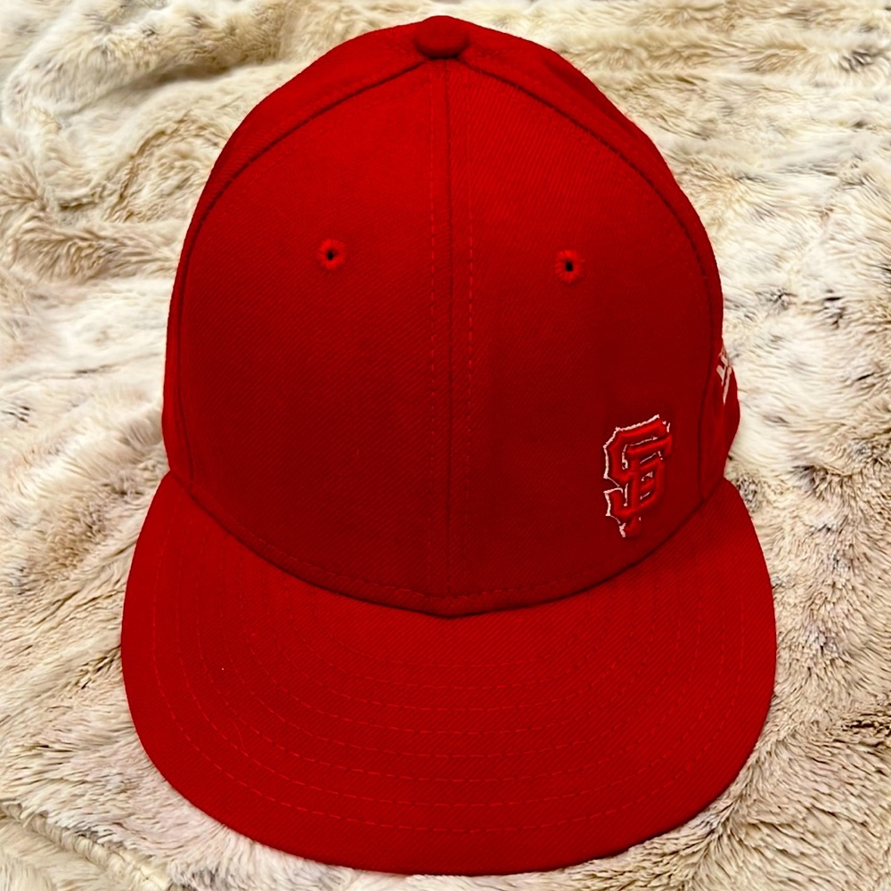 New Era red San Francisco Giants hat.